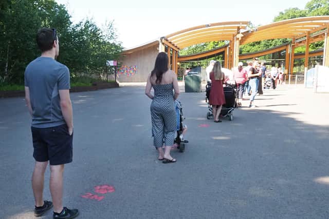 Visitors observe the two metre social distancing rule as Whipsnade Zoo reopens, but what will be the impact of the restriction on the rest of the tourism sector?