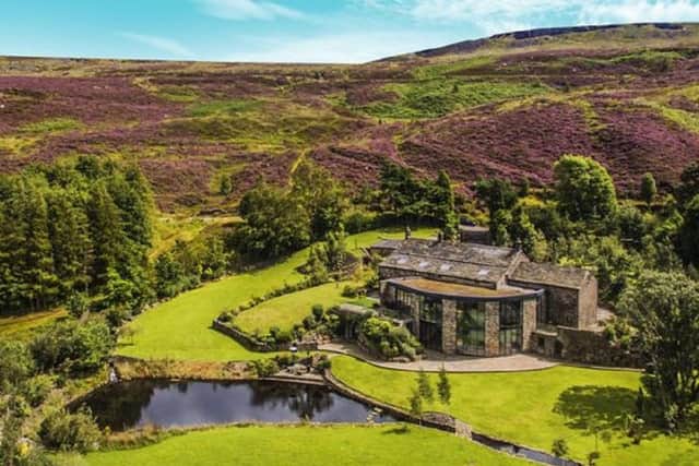 Number 1 with 6,305 views: Lower Scout in Marsden, near Huddersfield, 2.5m, is a Grade II listed home has five bedrooms and its own waterfall and lake.