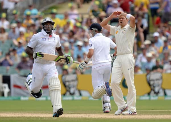 Australia's Peter Siddle (right) reacts as England's Michael Carberry (left) and Joe Root (centre) run between the wickets during day four of the Second Test Match at the Adelaide Oval, Adelaide, Australia. PRESS ASSOCIATION Photo. Picture date: Sunday December 8, 2013. See PA story CRICKET England. Photo credit should read: Anthony Devlin/PA Wire. RESTRICTIONS: Editorial use only; Strictly no commercial use; No transmission of sound or moving images;  No use with any unofficial third party logos. Call +44 (0)1158 447447 for further information.