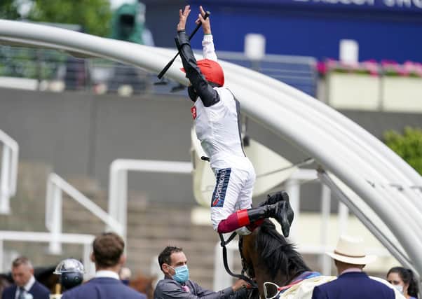 Frankie Dettori leaps fro mFrankly Darling after her Ribblesdale Stakes win on day one of Royal Ascot.