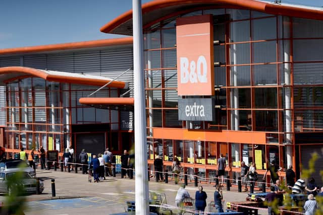 Shoppers queue outside B&Q during the coronavirus pandemic.