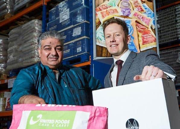 Saleem Akhtar, CEO of Jinnah Group, left, with Lee Rycraft, relationship director at Lloyds Bank,