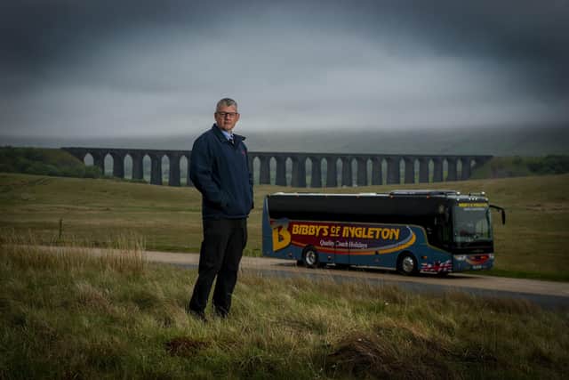 Chris Bibby who runs the coach company Bibby's of Ingleton, pictured at Ribblehead Viaduct in the Yorkshire Dales National Park. Picture Tony Johnson