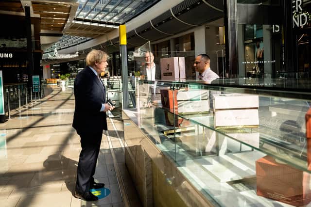 Boris Johnson during a visit to a shoppping centre to mark the reopening of non-essential stores.