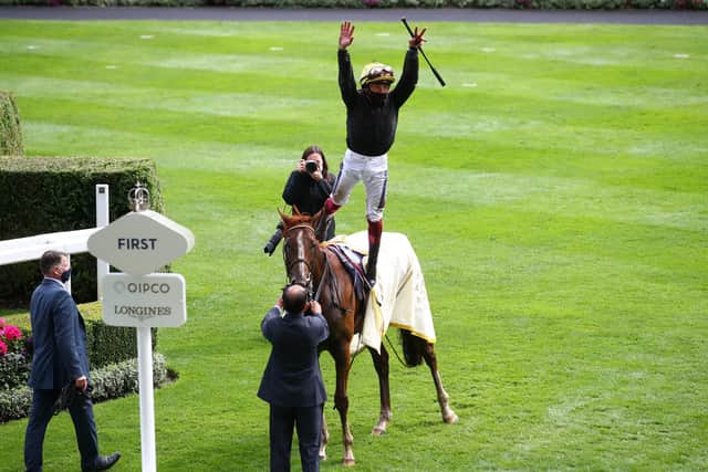 The absence of crowds did not dete Frankie Dettori from performing his flying dismount after Stradivarius won a third successive Ascot Gold Cup.