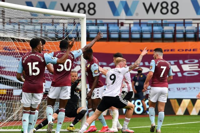 Aston Villa goalkeeper Orjan Nyland appears to carry the ball over the line as Sheffield United players appeal during the Premier League match at Villa Park. (Picture: Paul Ellis/PA)