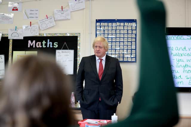Boris Johnson joins a socially distanced class at Bovingdon near Hemel Hempstead.