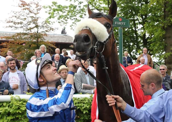 Hello Youmzain and Kevin Stott celebrate their win in the Sandy Lane Stakes at Haydock last year. Photo: John Grossick and Haydock Park.