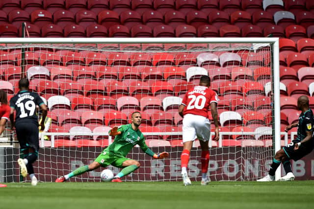 Boro custodian Dejan Stojanovic dives the wrong way as Swansea's Andre Ayew converts from the penalty spot to make it 3-0.