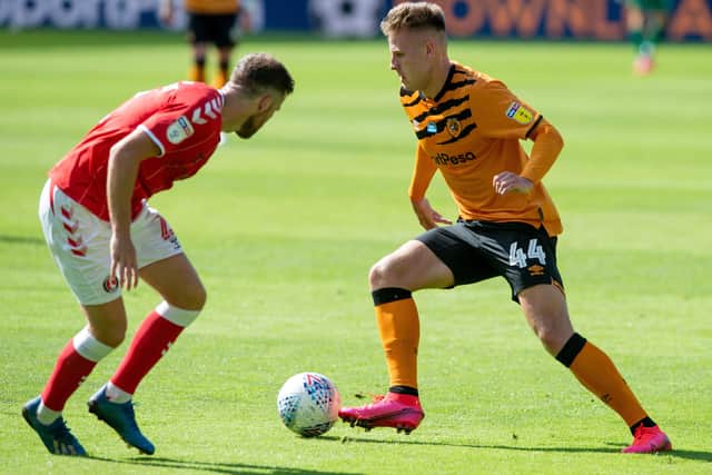 James Scott goes past Adam Matthews as 
Hull City lost to Charlton Athletic. (Picture: Bruce Rollinson)