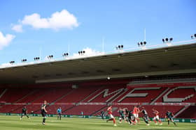 QUIET TIME: Middlesbrough and Swansea City play in front of empty stands at the Riverside Stadium: Owen Humphreys/PA