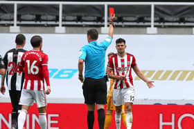 SEEING RED: John Egan is sent off at St. James's Park. Picture: Simon Bellis/Sportimage