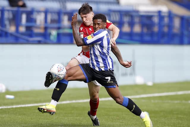 Sheffield Wednesday's Kadeem Harris battles for the ball with Nottingham Forest's Joe Lolley (Picture: PA)