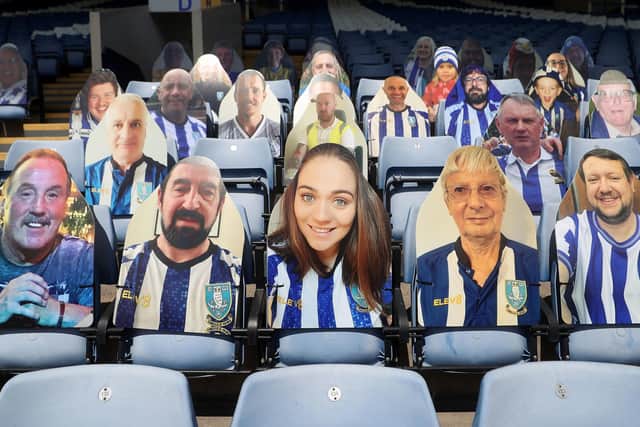 Silent supporters: Cardboard cutouts of Sheffield Wednesday fans in the stands. Picture: PA