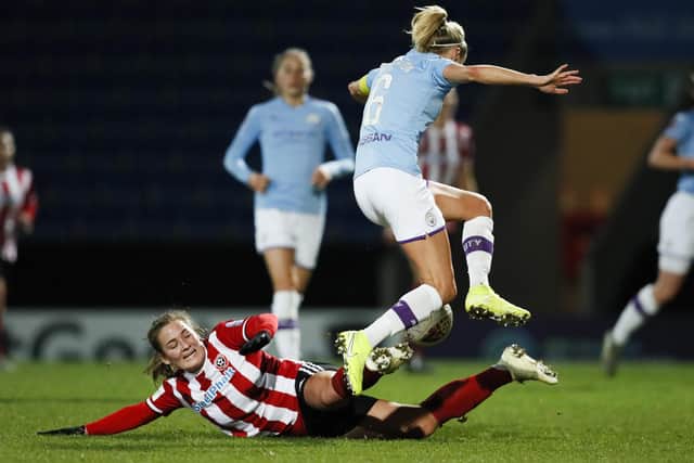 New dea l - Katie Wilkinson of Sheffield United tackles Steph Houghton of Manchester City during the The FA Women's Continental League Cup match at the Proact Stadium, Chesterfield. (Picture: James Wilson/Sportimage)