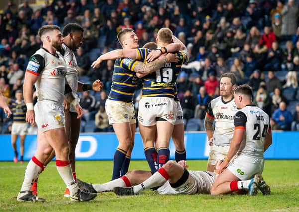 Picture by Allan McKenzie/SWpix.com - 05/03/2020 - Rugby League - Betfred Super League - Leeds Rhinos v Toronto Wolfpack - Emerald Headingley Stadium, Leeds, England - Toronto's dejection shows as Leeds's Mikolaj Oledzki is congratulated by Callum McLelland on his try.