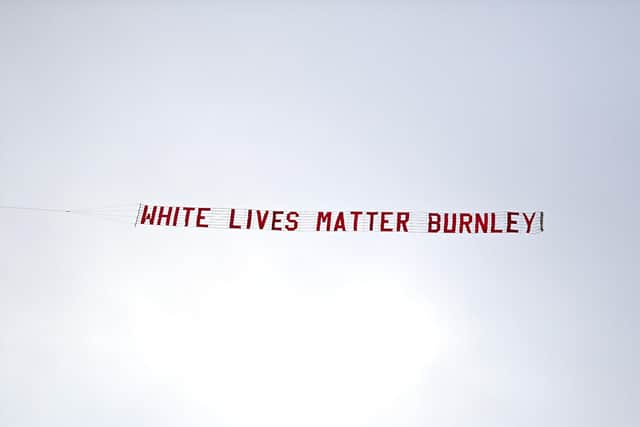 Banner: A plane flies over the stadium with a banner reading 'White Lives Matter Burnley' during the Premier League match at the Etihad Stadium, Manchester. Picture: PA