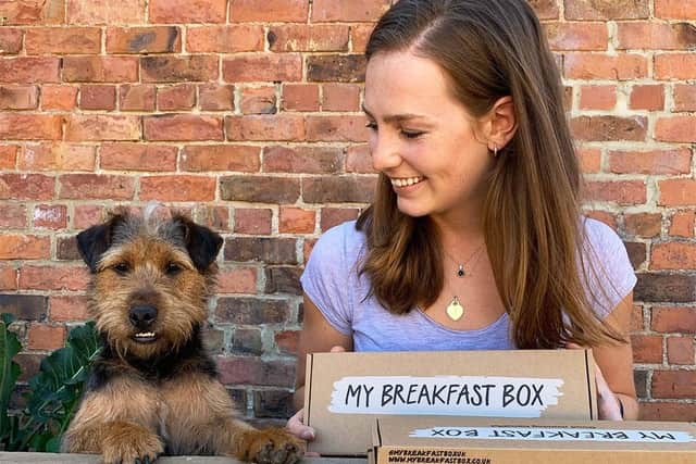 Jodie with her dog Rufus and one of her Breakfast Boxes