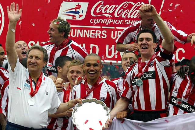 File photo dated 30-04-2006 of Sheffield United's manager Neil Warnock (front left) and Chris Morgan (front right) celebrate with the trophy PRESS ASSOCIATION Photo. Issue date: Thursday November 29, 2018. Neil Warnock, football's Mr Marmite, turns 70 on Saturday admitting he would be as happy managing in a Sunday league as he is in the Premier League. See PA story SOCCER Warnock. Photo credit should read Nigel Roddis/PA Wire.