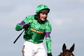 This was Liam Treadwell passing the Aintree winning post after winning the 2009 Grand National on Mon Mome.