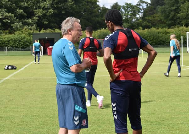 Neil Warnock chats with Middlesbrough defender ????