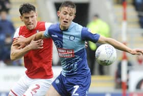 DISCUSSIONS: Rotherham United hope to keep full-back Billy Jones (pictured left)