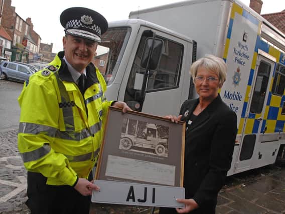 North Yorkshire Police's 'AJ1' registration, which was the first number plate registered in the county in 1903, pictured in 2007 with previous Chief Constable Grahame Maxwell