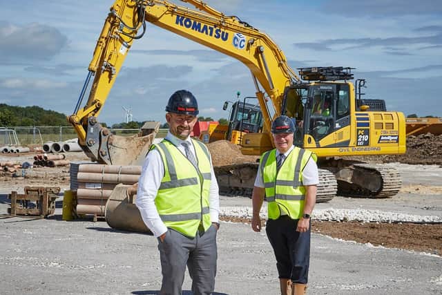 Chief Executive Richard Beal, foreground, and Construction Director John Goodfellow at the site in Goole where building work has begun on Beal Homes largest-ever development.