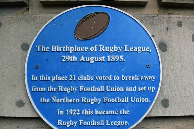 This blue plaque signifies the George Hotel's prestige as the birthplace of rugby league.