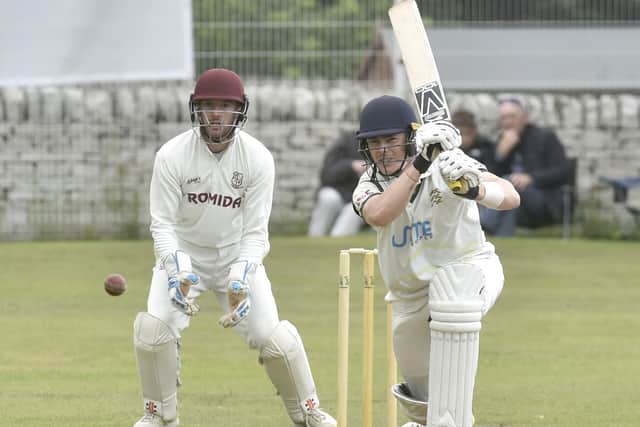 Flashback: action from last season's Bradford League Priestley Cup final at Undercliffe with New Farnley opener Adam Waite on his way to 97 not out, watched by Woodlands wicketkeeper Greg Finn. Picture: Steve Riding