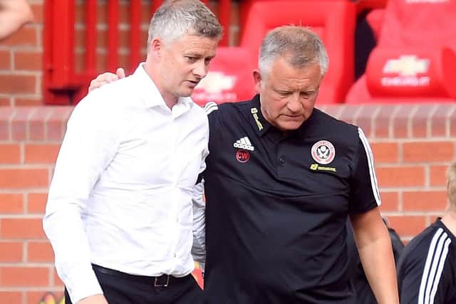 Manchester United manager Ole Gunnar Solskjaer and Sheffield United manager Chris Wilder (right) (Picture: PA)