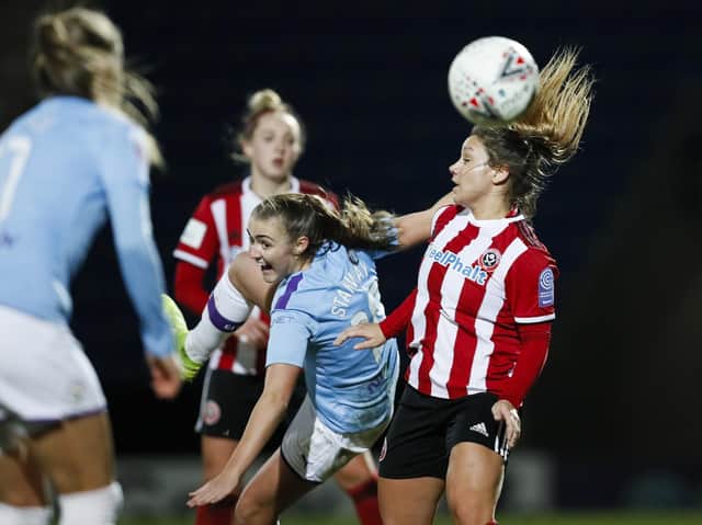 Alethea Paul, right, playing for Sheffield United Women against Manchester City.