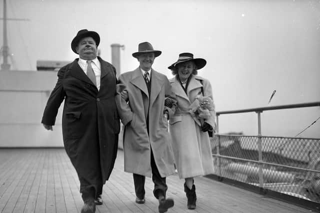11th February 1947:  American film star and comedian Oliver Hardy with his British born partner Stan Laurel and his wife, Virginia Laurel on board a ship in England.  (Photo by Express/Express/Getty Images)