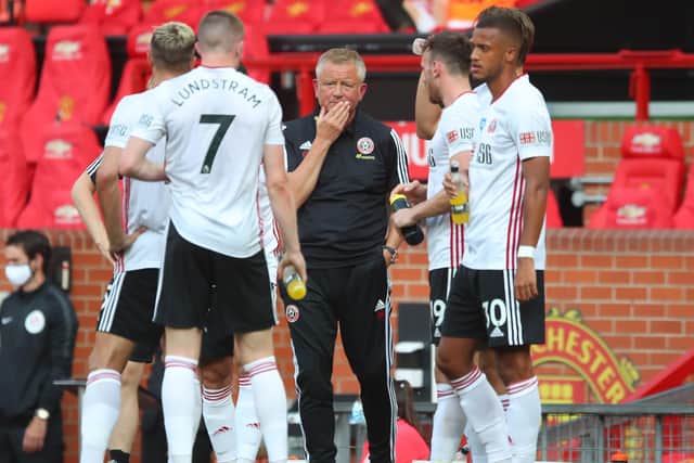Chris Wilder manager of Sheffield United addresses some of the players during the Premier League match at Old Trafford on Wednesday (Picture: Simon Bellis/Sportimage)
