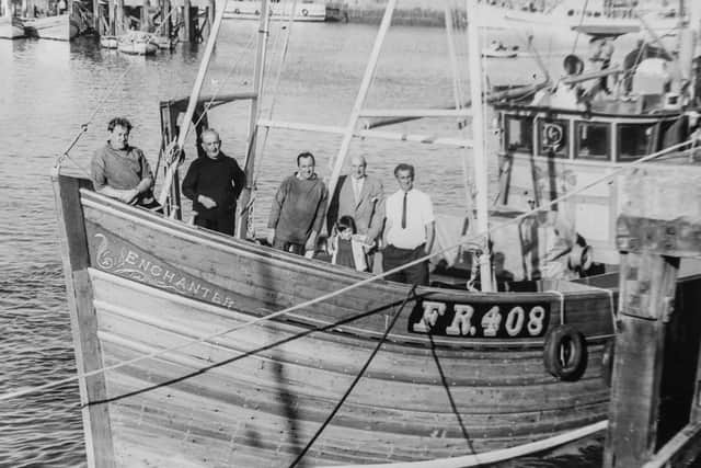 Pictured (Third from the left) Rolly Rollisson, on the Enchanter, with owner and crew.