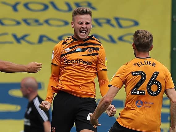 James Scott celebrates after heading Hull City into a 2-0 lead at Birmingham City. Picture: Getty Images