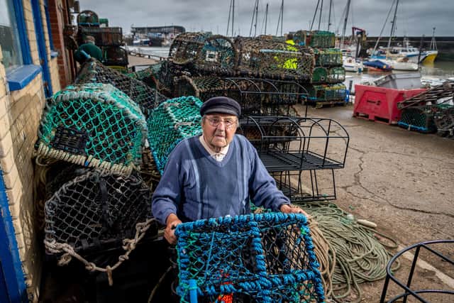 Rolly Rollisson, 92, Bridlington's oldest fisherman with his son Rolo, 58,  who still makes Parlour (lobster) pots for their shellfishing boat Elsie B from their unit alongside the Bridlington Harbour. Photo: James Hardisty.