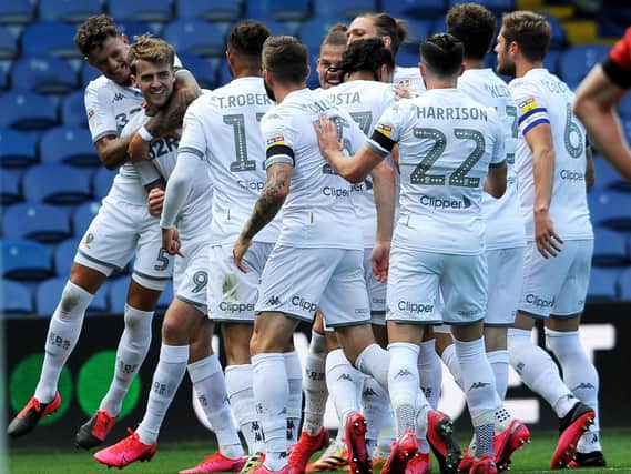 JOY: Leeds United players celebrate their opening goal, scored by Patrick Bamford (second from the left)