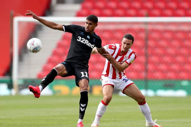 Forward - Middlesbrough's Ashley Fletcher (left) and Stoke City's James Chester (Picture: PA)