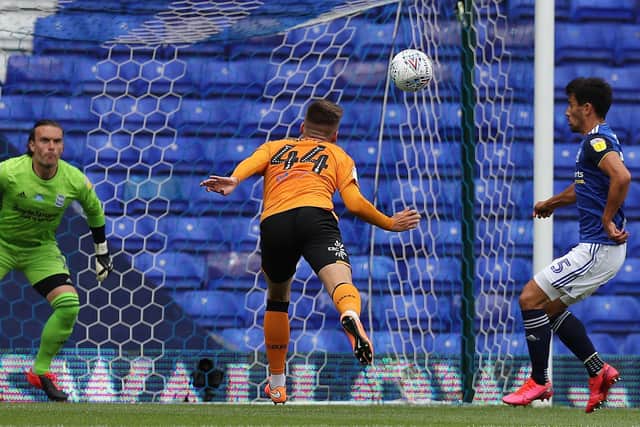 James Scott heads in the Tigers' second goal at St Andrew's. Picture: Getty Images