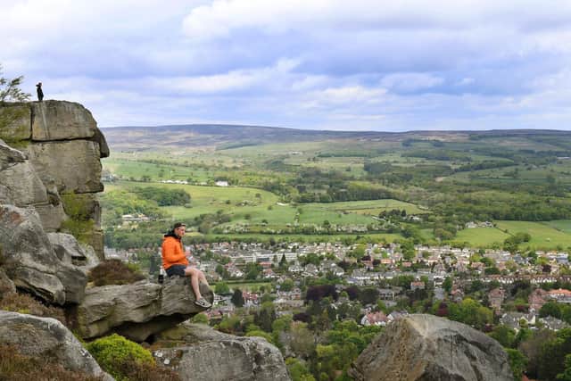 Adam Young stops for a coffee and take in the views on the Cow and Calf Rocks near Ilkley.