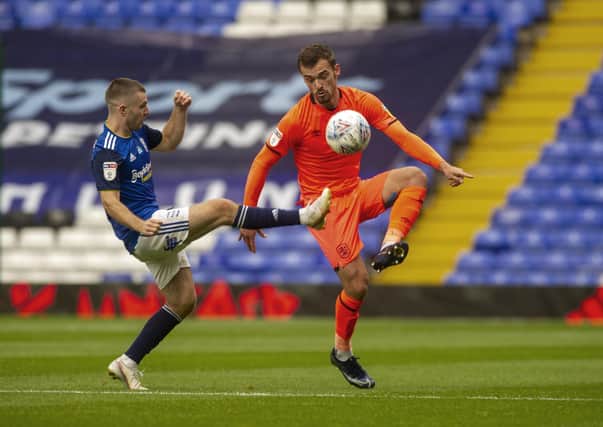 Huddersfield Town's  Harry Toffolo closed down by Blues' Dan Crowley. (Picture: Tony Johnson)