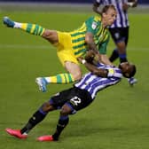 Kamil Grosicki of West Bromwich Albion stopped bt Moses Odubajo of Sheffield Wednesday (Picture: David Rogers/Getty Images)