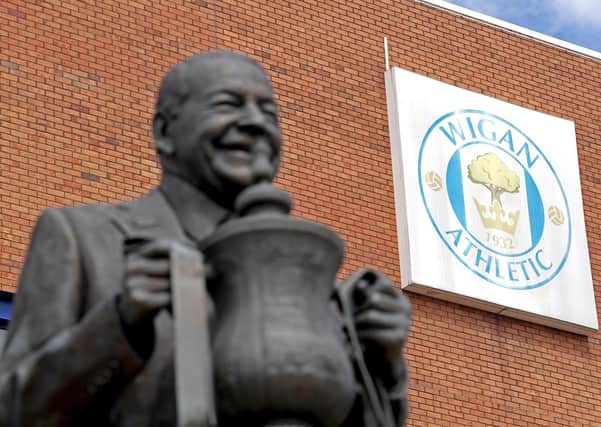 Wigan Athletic: A general view of the Dave Whelan statue outside the DW Stadium. Picture: PA