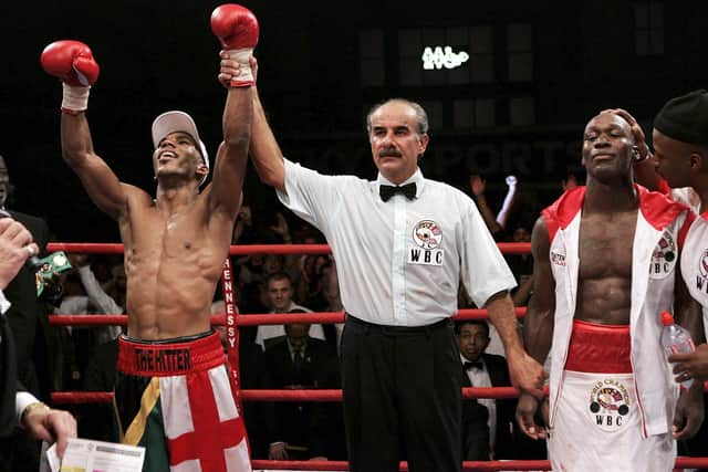 Top of the world:  Junior Witter (L) wins by unanimous decision during the WBC light-welterweight fight against DeMarcus Corley on September 15, 2006 at Alexandra Palace in London, England.  (Picture: John Gichigi/Getty Images)