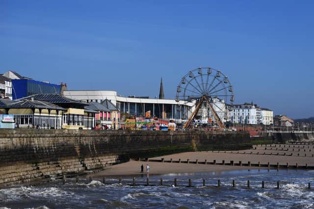 The towns seafront, with the fair and amusements. (Jonathan Gawthorpe).