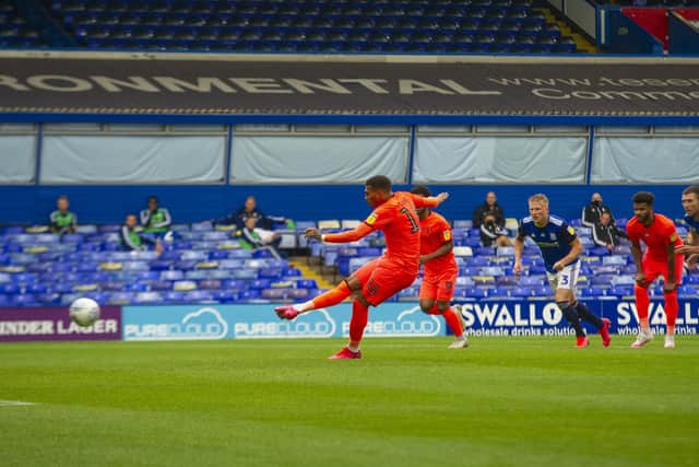 Huddersfield Town's Karlan Grant scores an early goal from the penalty spot at Birmingham. (Picture: Tony Johnson)