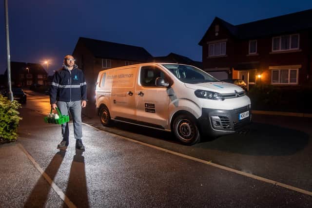 Milkman Andy Walker, aged 33, on his rounds in Pudsey, Leeds, delivering milk and Veg boxes for the Modern Milkman. Picture: James Hardisty