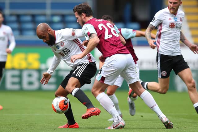 David McGoldrick of Sheffield United tackled by Kevin Long of Burnley (Picture:: Simon Bellis/Sportimage)