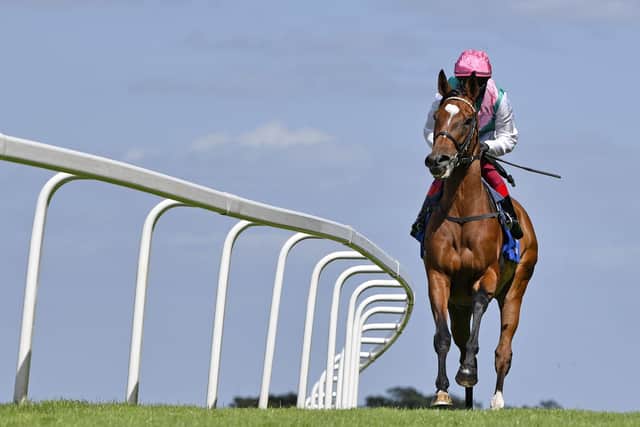 Enable and Frankie Dettori on the way to the start for the Coral-Eclipse at Sandown Park Racecourse.